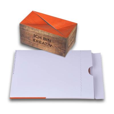 Springquader mit Aufreißverpackung - Druckerei Lindner - Ihr Hersteller für Effektkarten, Präsentationsboxen und Mailings